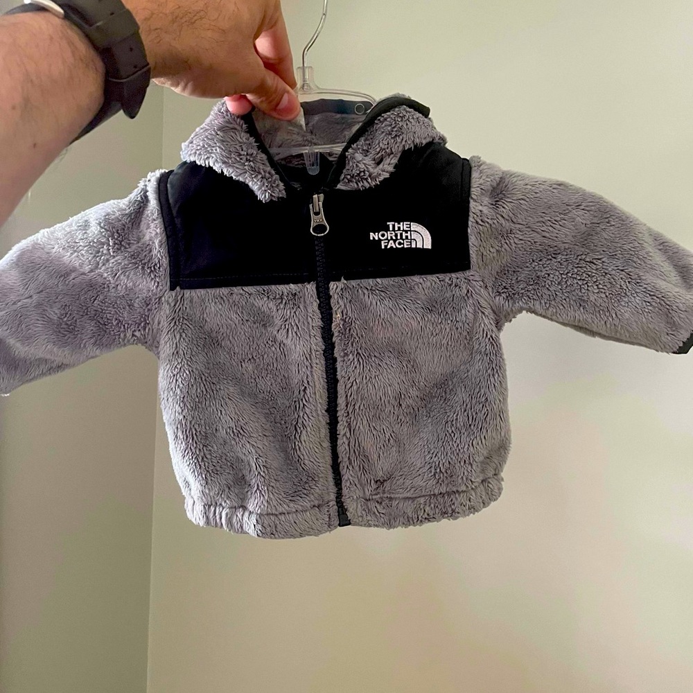 Fuzzy baby sweater by The North Face